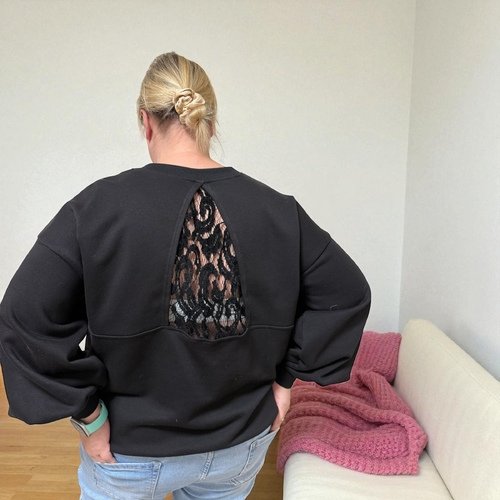 Nėrinių elegancija – oversize džemperis moterims